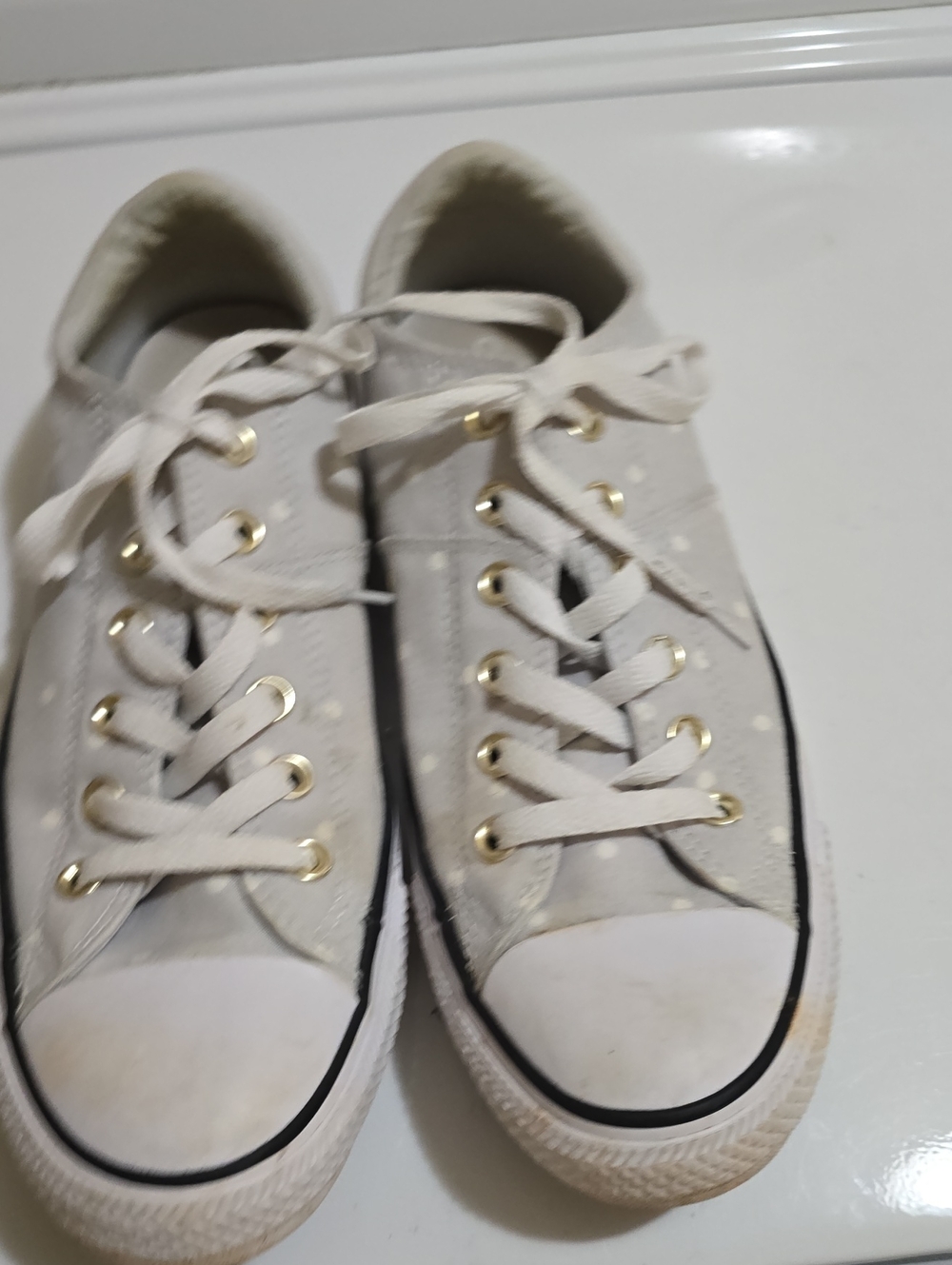 Converse Low-Top Canvas Sneakers in Light Gray with Gold Eyelets